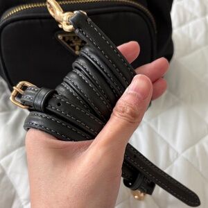 Black coach leather strap